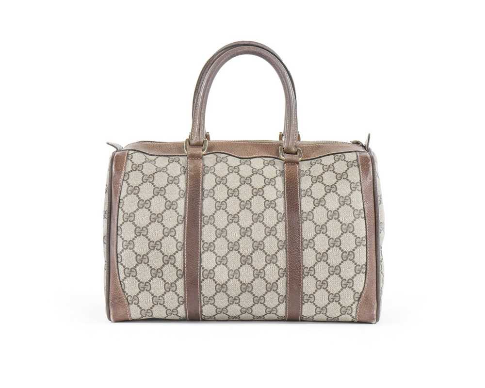 Lot 71 - A Gucci printed canvas bag, early 1970s, with...