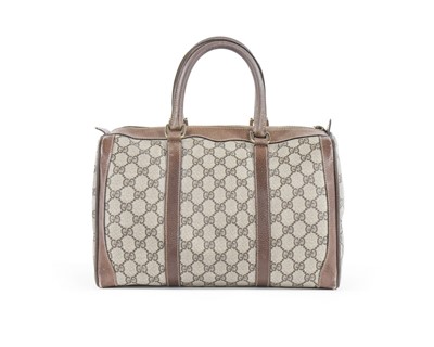 Lot 71 - A Gucci printed canvas bag, early 1970s, with...