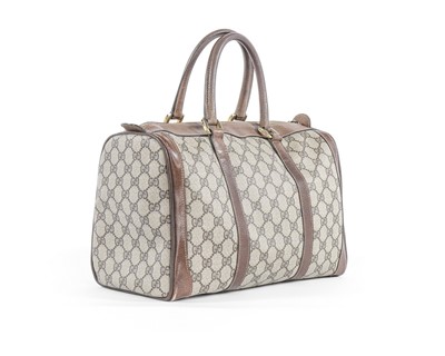 Lot 71 - A Gucci printed canvas bag, early 1970s, with...
