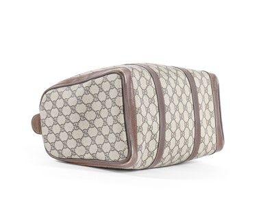 Lot 71 - A Gucci printed canvas bag, early 1970s, with...
