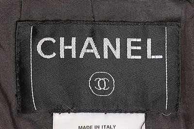 Lot 75 - A Chanel denim and leather ensemble, 2000,...