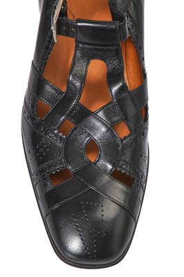 Lot 22 - A pair of Gucci by Alessandro Michelle men's black leather 'cutout' brogues, Autumn-Winter 2017-18