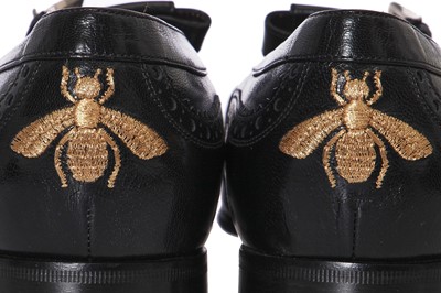 Lot 22 - A pair of Gucci by Alessandro Michelle men's black leather 'cutout' brogues, Autumn-Winter 2017-18