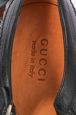 Lot 22 - A pair of Gucci by Alessandro Michelle men's black leather 'cutout' brogues, Autumn-Winter 2017-18
