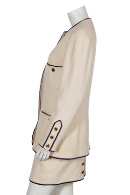 Lot 13 - A Chanel cream wool blend bouclé suit, Spring-Summer 1994
