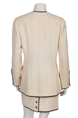 Lot 13 - A Chanel cream wool blend bouclé suit, Spring-Summer 1994