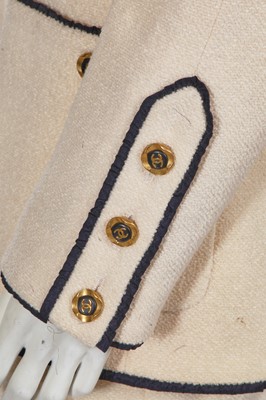 Lot 13 - A Chanel cream wool blend bouclé suit, Spring-Summer 1994