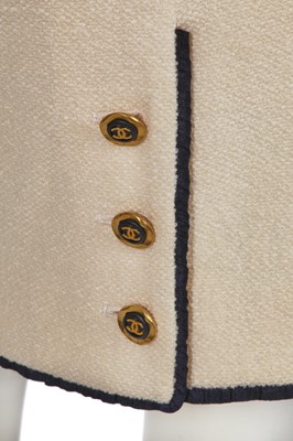 Lot 13 - A Chanel cream wool blend bouclé suit, Spring-Summer 1994