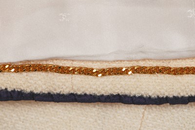 Lot 13 - A Chanel cream wool blend bouclé suit, Spring-Summer 1994