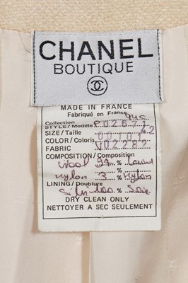 Lot 13 - A Chanel cream wool blend bouclé suit, Spring-Summer 1994