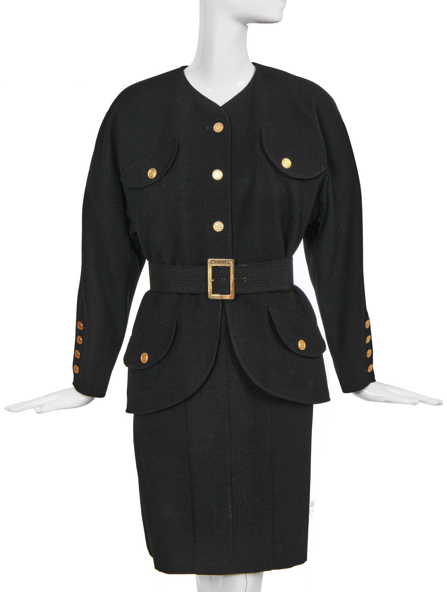 Lot 15 - A Chanel black wool suit, mid-1980s