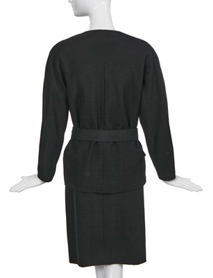 Lot 15 - A Chanel black wool suit, mid-1980s
