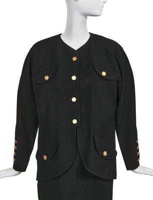 Lot 15 - A Chanel black wool suit, mid-1980s