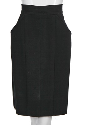 Lot 15 - A Chanel black wool suit, mid-1980s