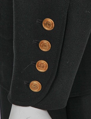 Lot 15 - A Chanel black wool suit, mid-1980s