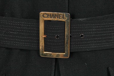 Lot 15 - A Chanel black wool suit, mid-1980s