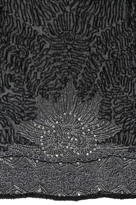 Lot 82 - A silver and black bugle beaded muslin jacket,...