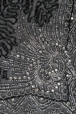 Lot 82 - A silver and black bugle beaded muslin jacket,...