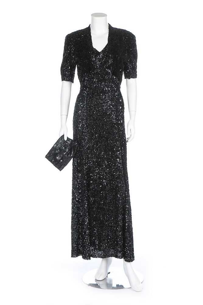 Lot 83 - A bias-cut fully sequinned evening gown, 1930s,...