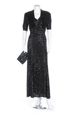 Lot 83 - A bias-cut fully sequinned evening gown, 1930s,...