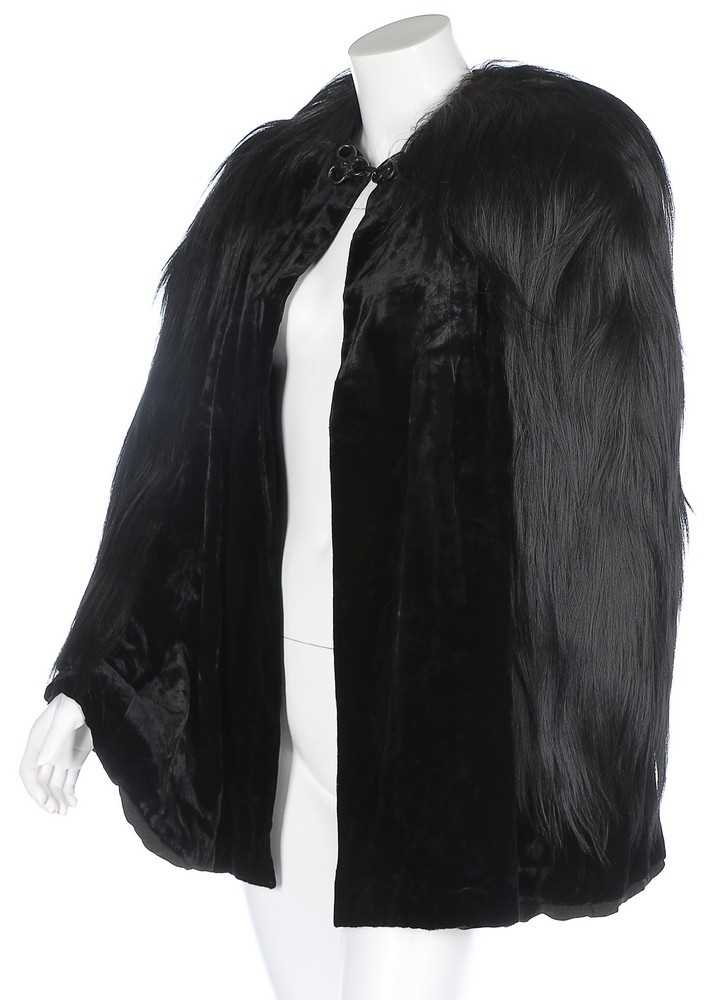 Lot 84 - A Julia Dubois black velvet evening cape...