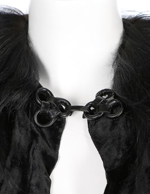 Lot 84 - A Julia Dubois black velvet evening cape...