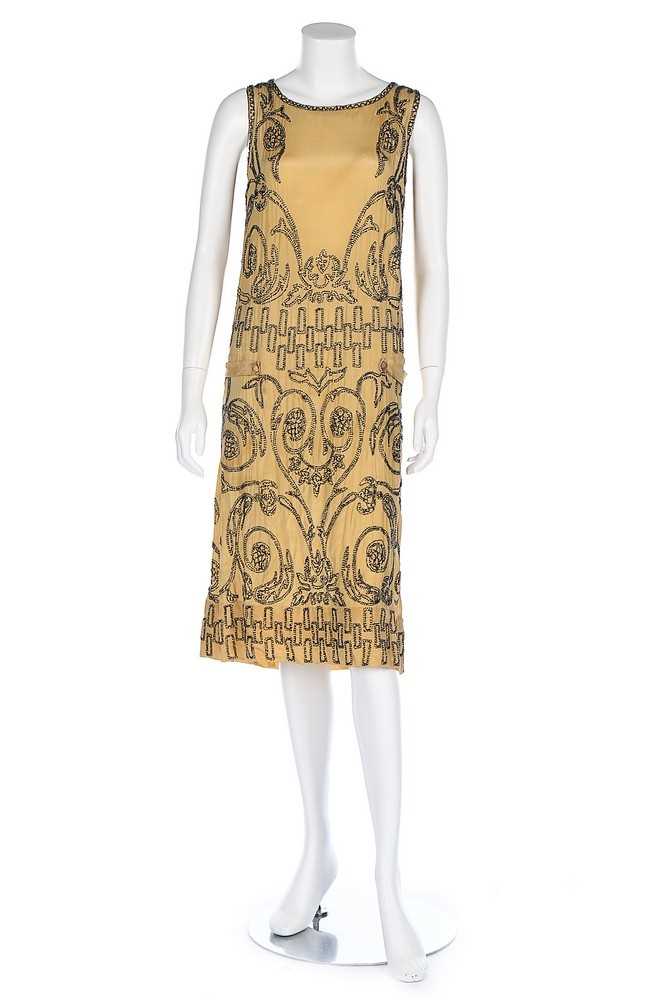 Lot 85 - An Adair beaded yellow silk flapper dress,...