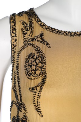 Lot 85 - An Adair beaded yellow silk flapper dress,...