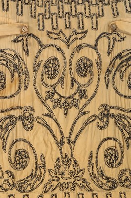 Lot 85 - An Adair beaded yellow silk flapper dress,...