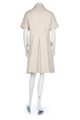 Lot 91 - A Pierre Cardin cream leather coat-dress, late...