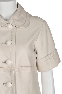 Lot 91 - A Pierre Cardin cream leather coat-dress, late...