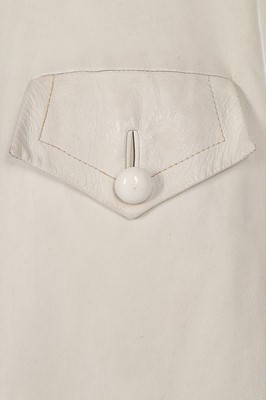 Lot 91 - A Pierre Cardin cream leather coat-dress, late...