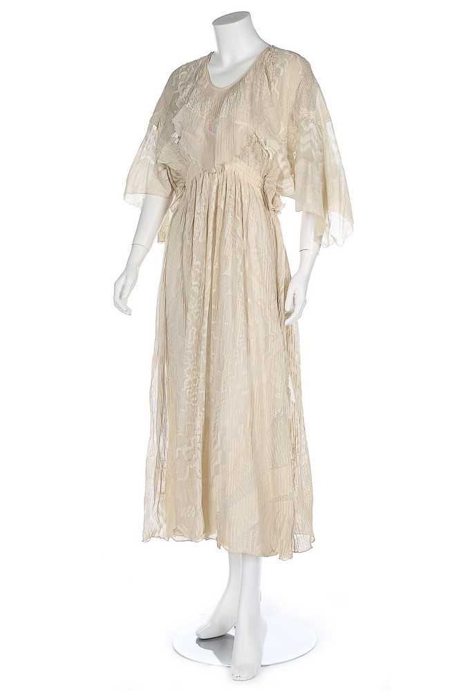Lot 93 - A Zandra Rhodes cream chiffon 'Lace Mountain'...