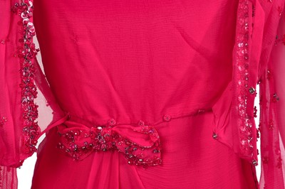 Lot 89 - A Christian Dior by John Galliano embellished raspberry-pink silk chiffon evening gown, circa 2007