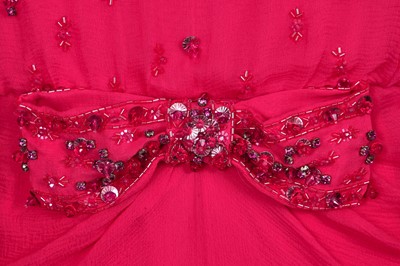 Lot 89 - A Christian Dior by John Galliano embellished raspberry-pink silk chiffon evening gown, circa 2007