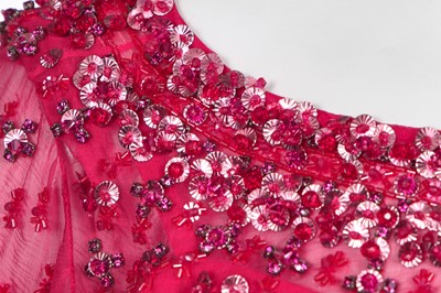 Lot 89 - A Christian Dior by John Galliano embellished raspberry-pink silk chiffon evening gown, circa 2007