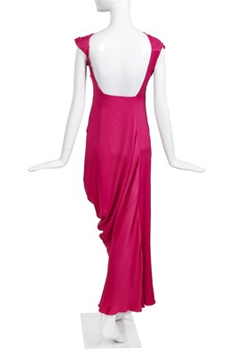 Lot 87 - A John Galliano raspberry-pink silk evening gown, commercial collection 2007