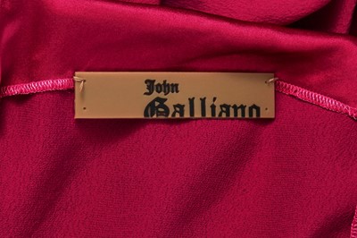 Lot 87 - A John Galliano raspberry-pink silk evening gown, commercial collection 2007