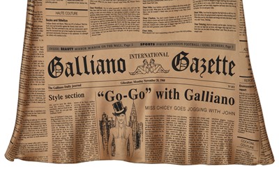 Lot 77 - A John Galliano 'Galliano Gazette' newspaper print dress, 'Too Rich to Walk' collection, Spring-Summer 2005