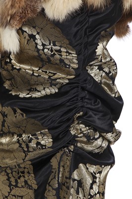 Lot 85 - A John Galliano black silk and fur dress, 'Esquimeau' collection, Autumn-Winter 2002-03