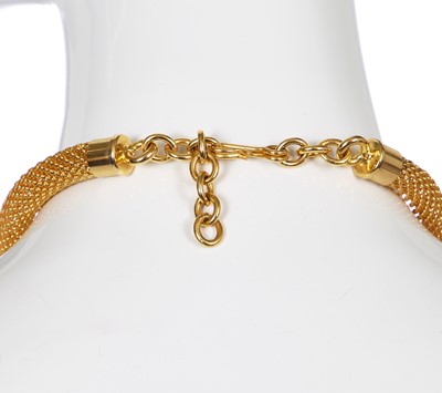 Lot 135 - A good Gianni Versace gilt metal crucifix necklace, 1991