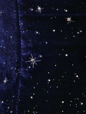 Lot 143 - A Rifat Ozbek navy blue velvet 'night sky' cocktail suit, 1990s