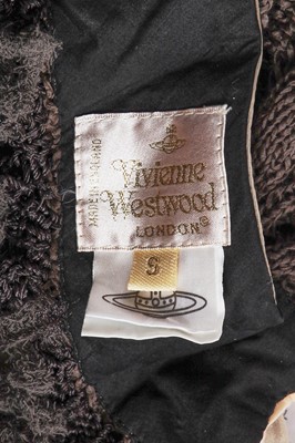 Lot 103 - A Vivienne Westwood brown knitted ensemble, 'Cafe Society' collection, Spring-Summer 1994