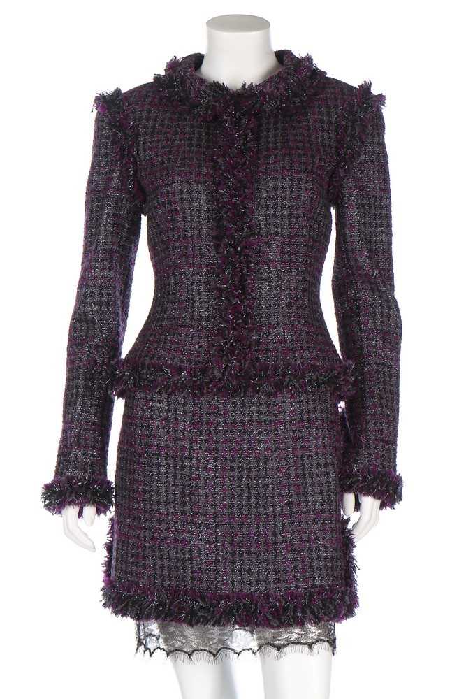 Lot 42 - A Chanel purple tweed suit, Autumn 2003,...