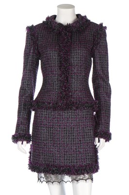 Lot 42 - A Chanel purple tweed suit, Autumn 2003,...