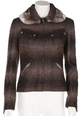 Lot 42 - A Chanel purple tweed suit, Autumn 2003,...