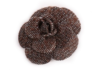 Lot 42 - A Chanel purple tweed suit, Autumn 2003,...