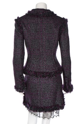 Lot 42 - A Chanel purple tweed suit, Autumn 2003,...