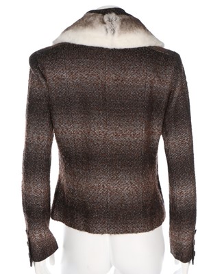 Lot 42 - A Chanel purple tweed suit, Autumn 2003,...
