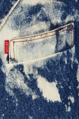 Lot 85 - An Alexander McQueen men's bleached denim coat, 'It's a Jungle Out There' collection, Autumn-Winter 1997-98